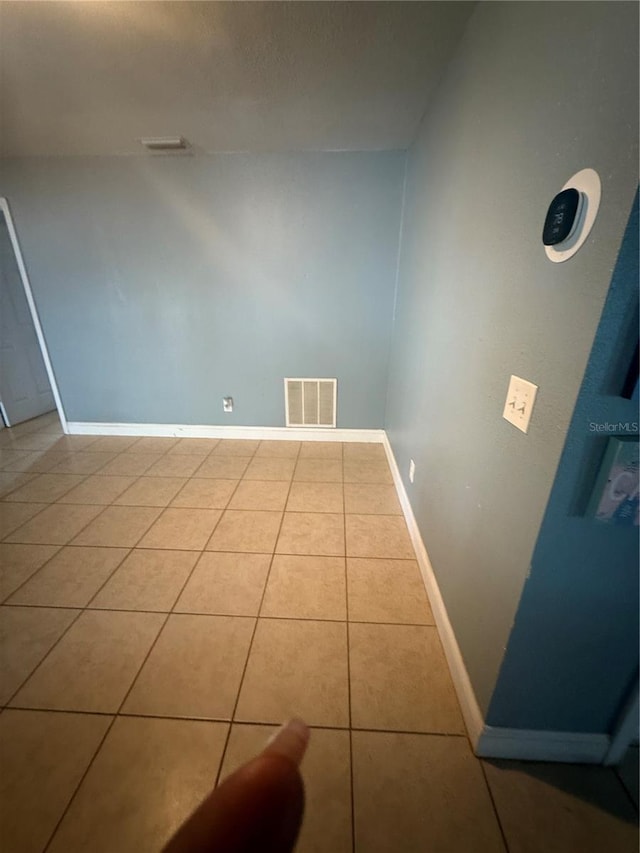 100 Huntswood Ct, Longwood, FL 32750 - unfurnished room featuring tile patterned floors and baseboards