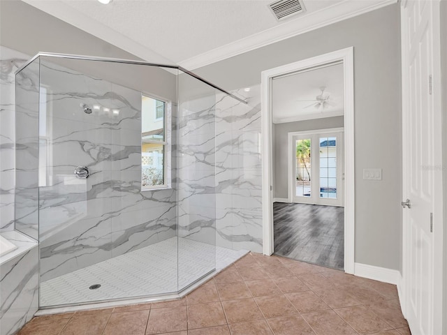 7548 Gathering Dr, Reunion, FL 34747 - bathroom featuring a marble finish shower, visible vents, a healthy amount of sunlight, and crown molding