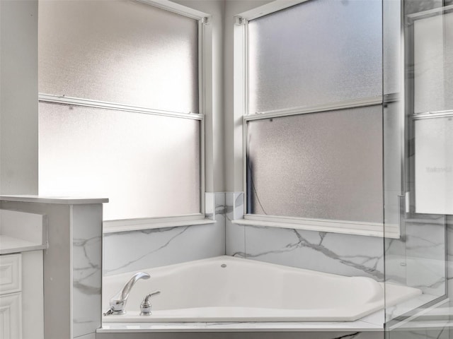 7548 Gathering Dr, Reunion, FL 34747 - full bath featuring a bath