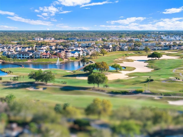 7548 Gathering Dr, Reunion, FL 34747 - birds eye view of property with golf course view, a residential view, and a water view
