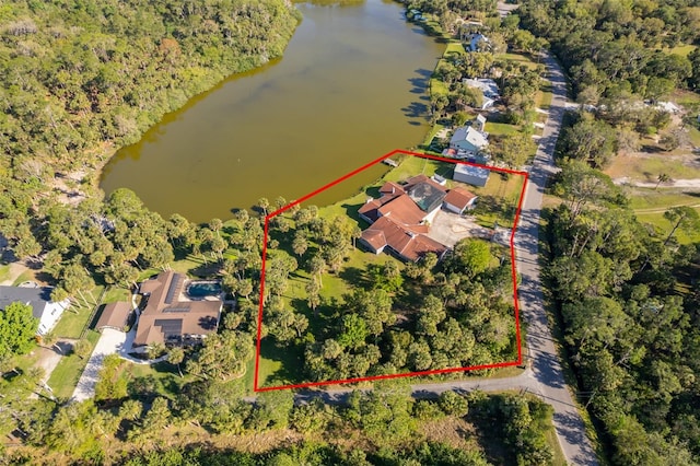 birds eye view of property featuring a water view