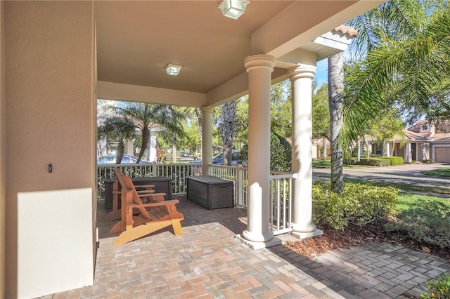 view of patio featuring a porch