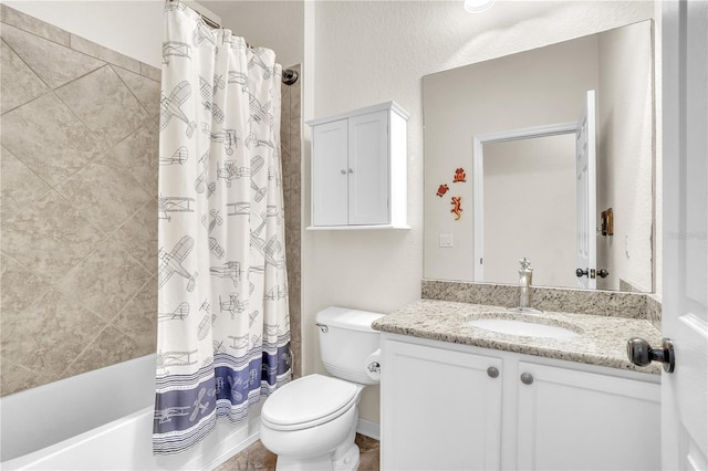 full bath featuring toilet, vanity, and shower / tub combo