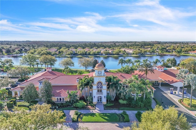 birds eye view of property with a water view