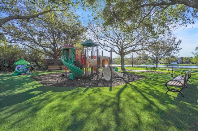 community playground featuring a yard