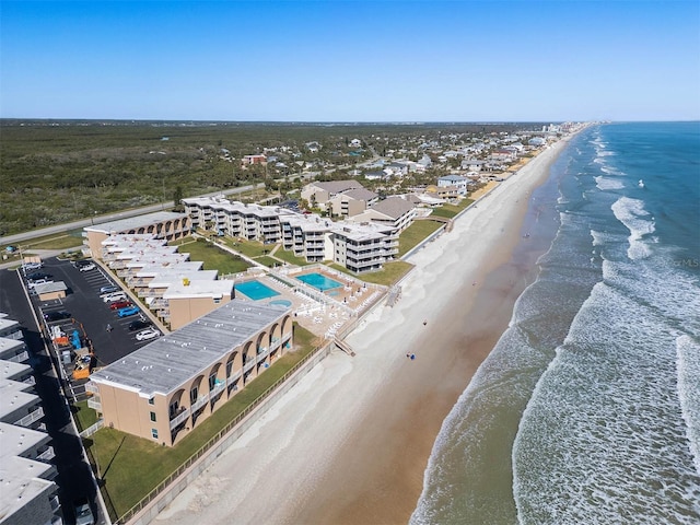 aerial view with a view of the beach and a water view