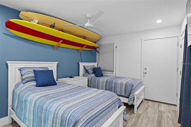 bedroom featuring recessed lighting and wood finished floors