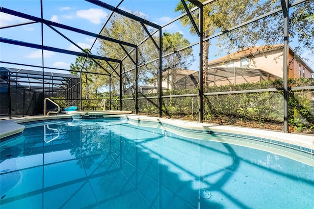 outdoor pool featuring glass enclosure