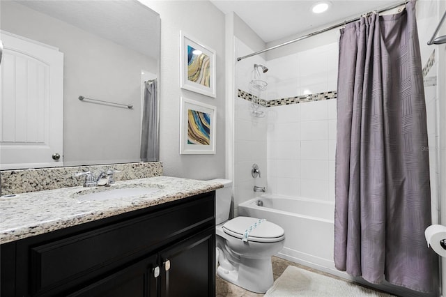 bathroom featuring shower / tub combo with curtain, toilet, and vanity