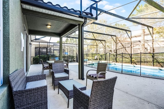 view of patio / terrace with a lanai, an outdoor living space, an outdoor pool, and outdoor dining area