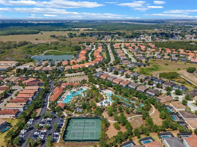 birds eye view of property featuring a residential view and a water view