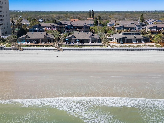 birds eye view of property featuring a residential view and a water view