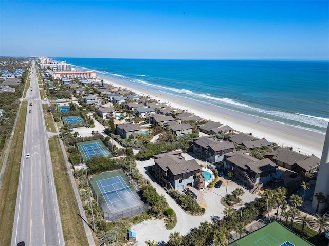 bird's eye view with a beach view and a water view