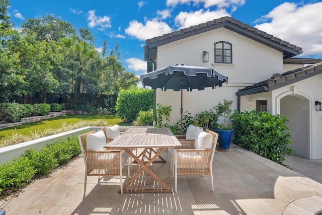 view of patio with outdoor dining area