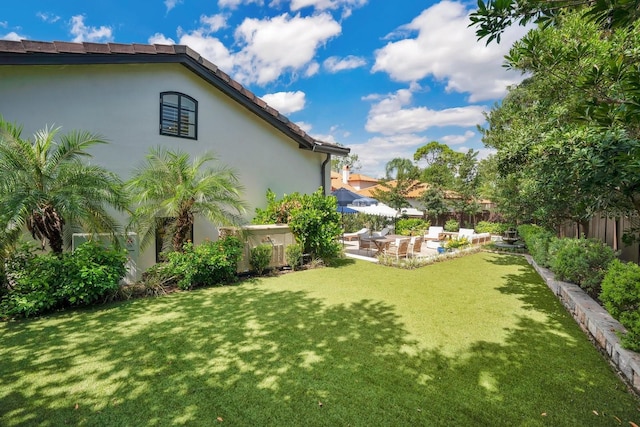 view of yard with a patio area and fence