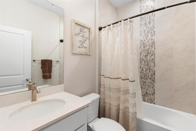 bathroom featuring vanity, toilet, and shower / bath combo