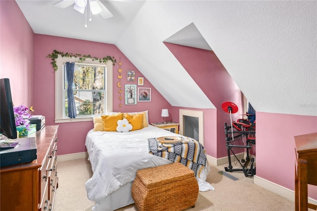 bedroom with vaulted ceiling, a ceiling fan, baseboards, and carpet floors