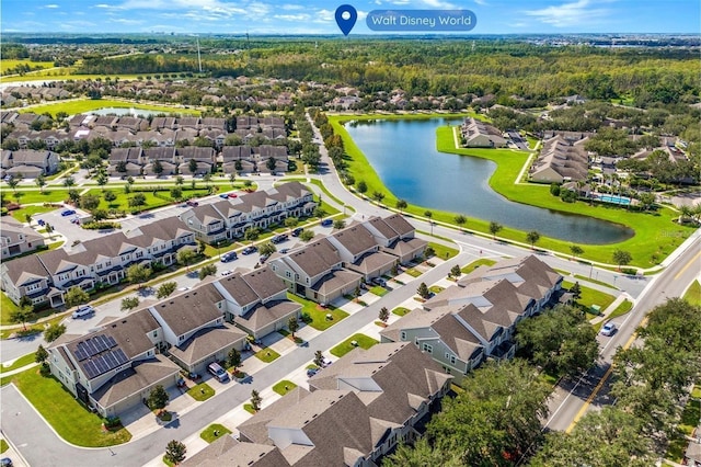 birds eye view of property featuring a residential view and a water view