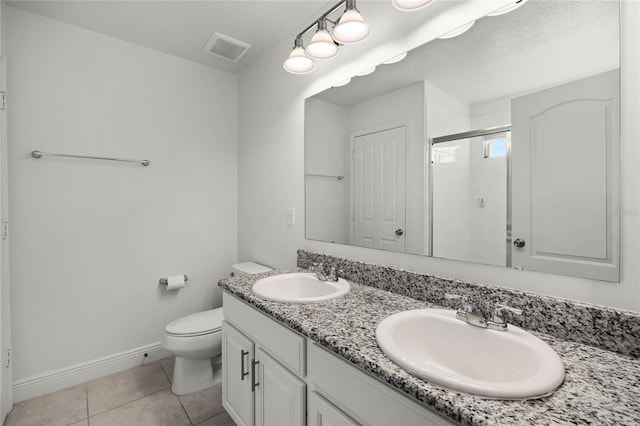 full bath with tile patterned flooring, a shower stall, visible vents, and a sink