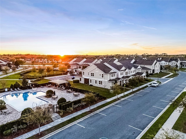 aerial view at dusk with a residential view