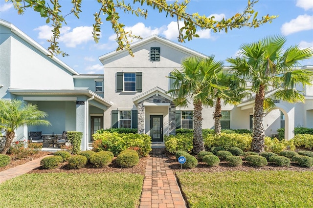 view of front of home featuring stucco siding