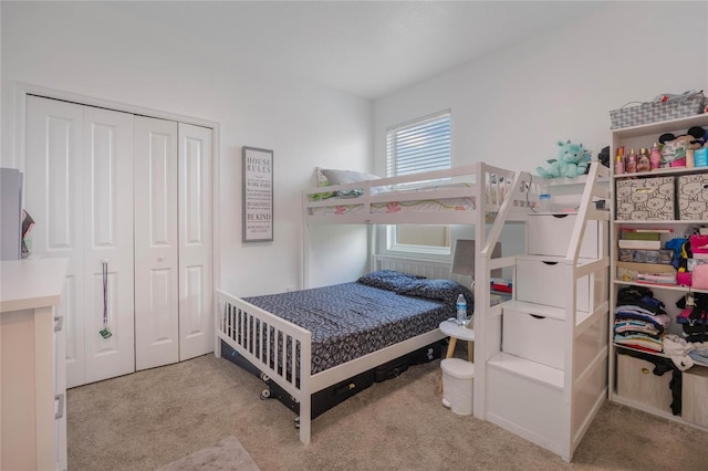 carpeted bedroom with a closet