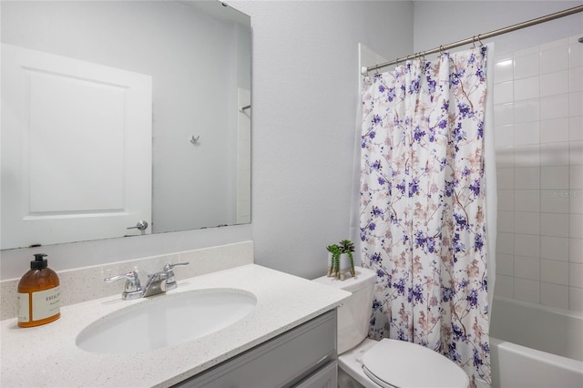 bathroom with vanity, toilet, and shower / bath combo with shower curtain