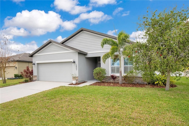 single story home featuring a garage, concrete driveway, a front lawn, and stucco siding