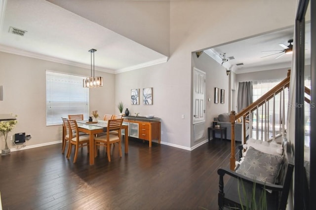 dining area with visible vents, baseboards, and dark wood-style floors