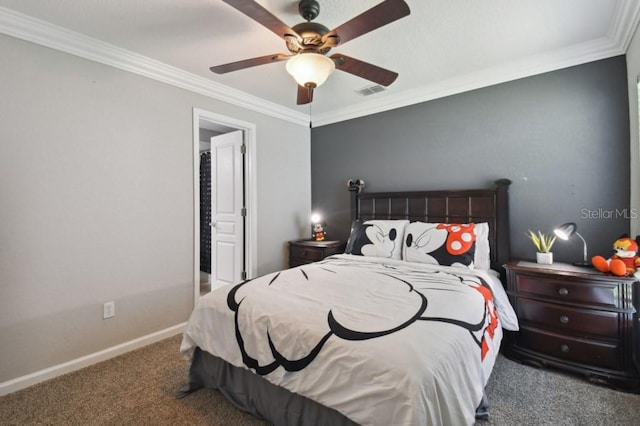 carpeted bedroom with ceiling fan, baseboards, and ornamental molding