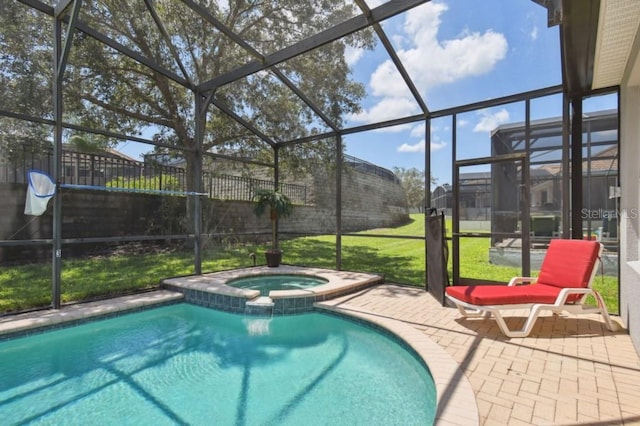 view of swimming pool with a lanai, a patio area, a pool with connected hot tub, and a lawn