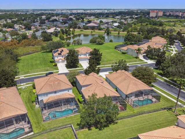 bird's eye view featuring a residential view and a water view