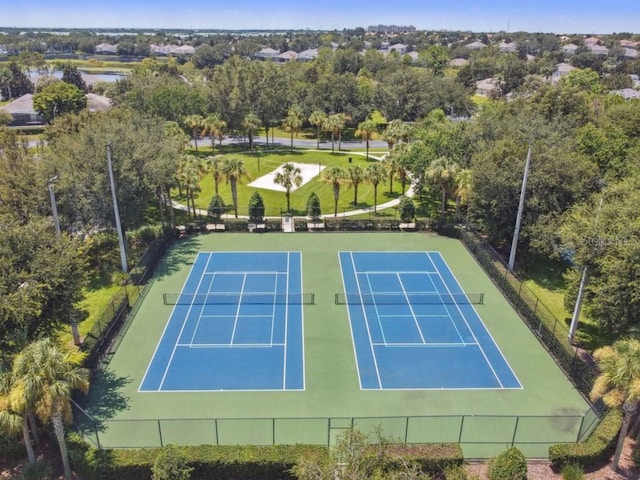 view of tennis court with fence