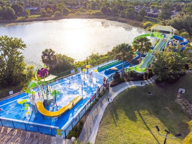 birds eye view of property with a water view