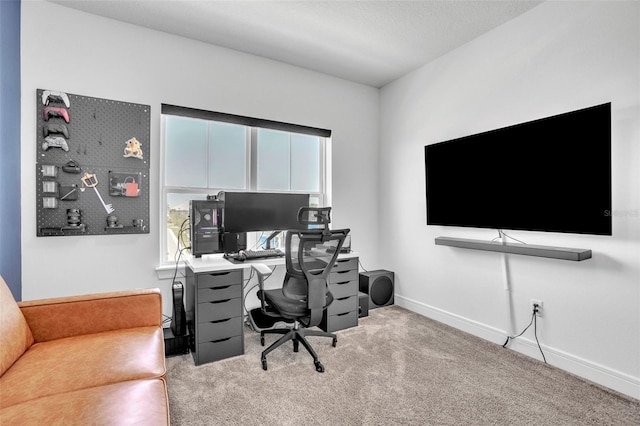 office featuring baseboards and carpet floors