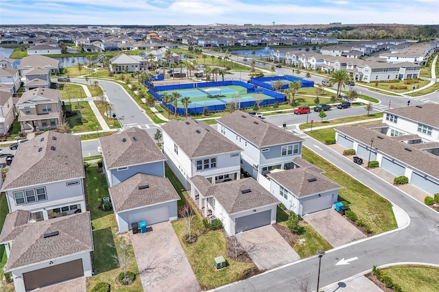 birds eye view of property with a residential view