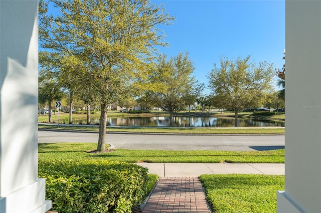 exterior space with a water view