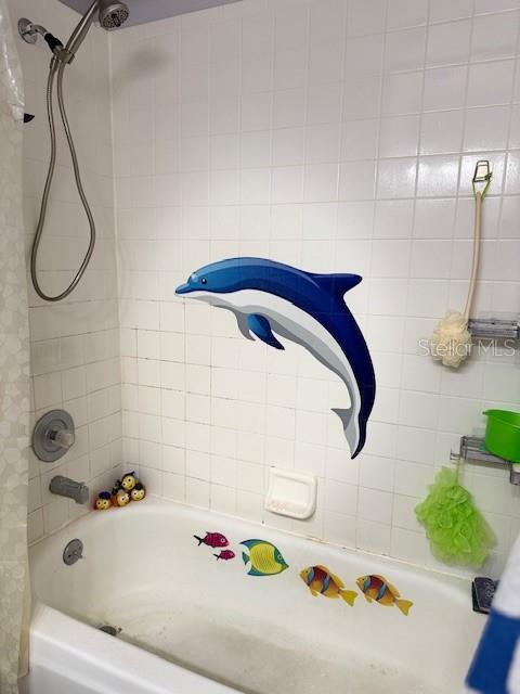 bathroom featuring tub / shower combination