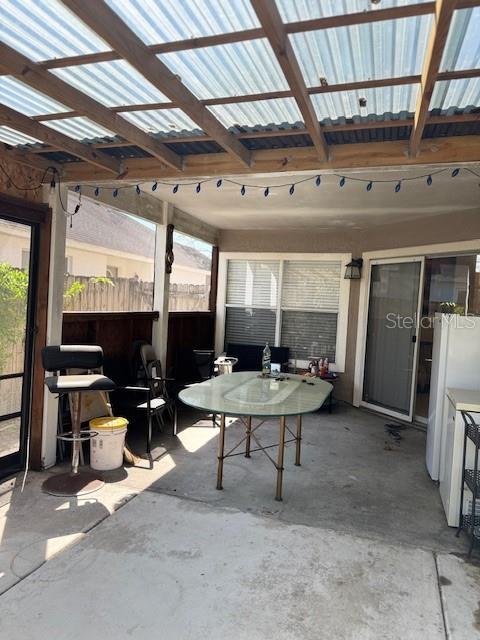 view of patio / terrace with fence