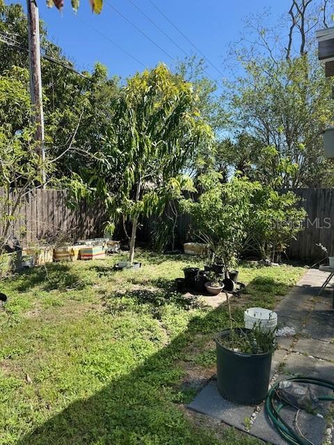 view of yard featuring a fenced backyard