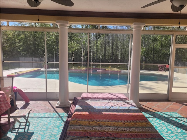 outdoor pool with a lanai and a patio area