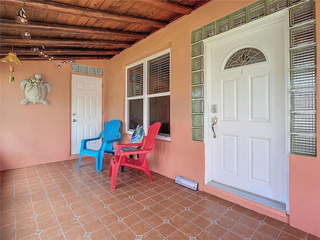 entrance to property with covered porch