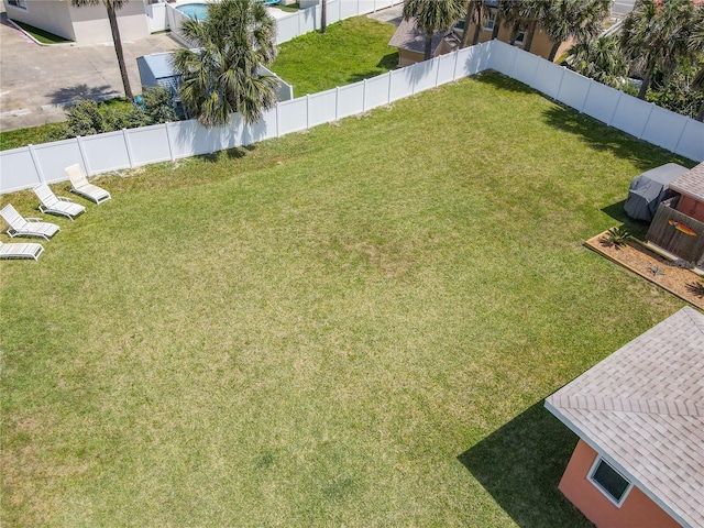 view of yard featuring a fenced backyard