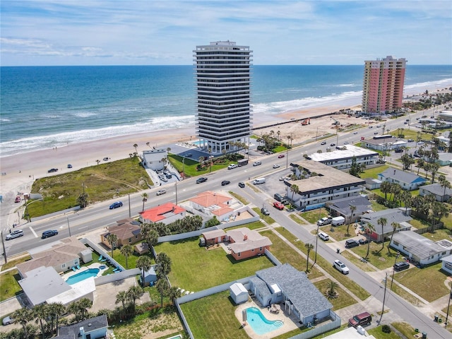 aerial view featuring a beach view and a water view