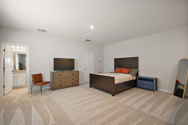 bedroom with baseboards, visible vents, light carpet, and attic access