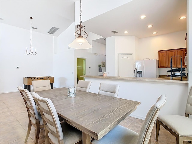 dining area with light tile patterned floors, recessed lighting, and visible vents