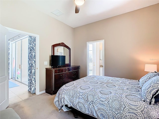 carpeted bedroom featuring visible vents and ceiling fan