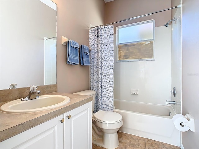 full bathroom with vanity, toilet, shower / tub combo, and tile patterned flooring