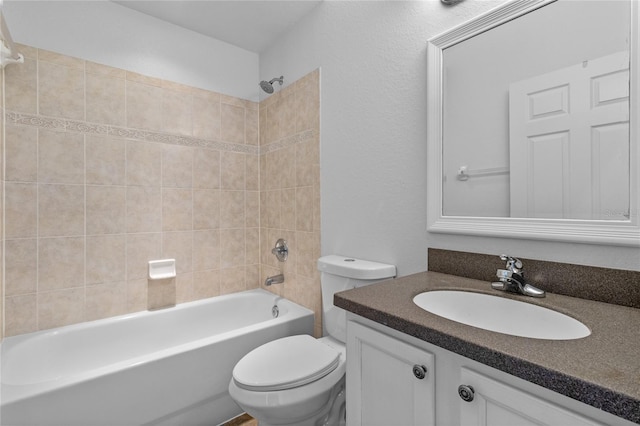 full bath with tub / shower combination, toilet, and vanity