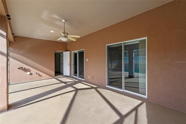 view of patio featuring a ceiling fan